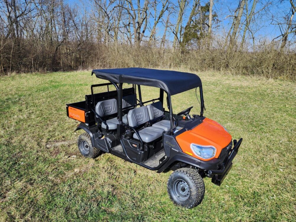 Orange off-road utility vehicle with roof