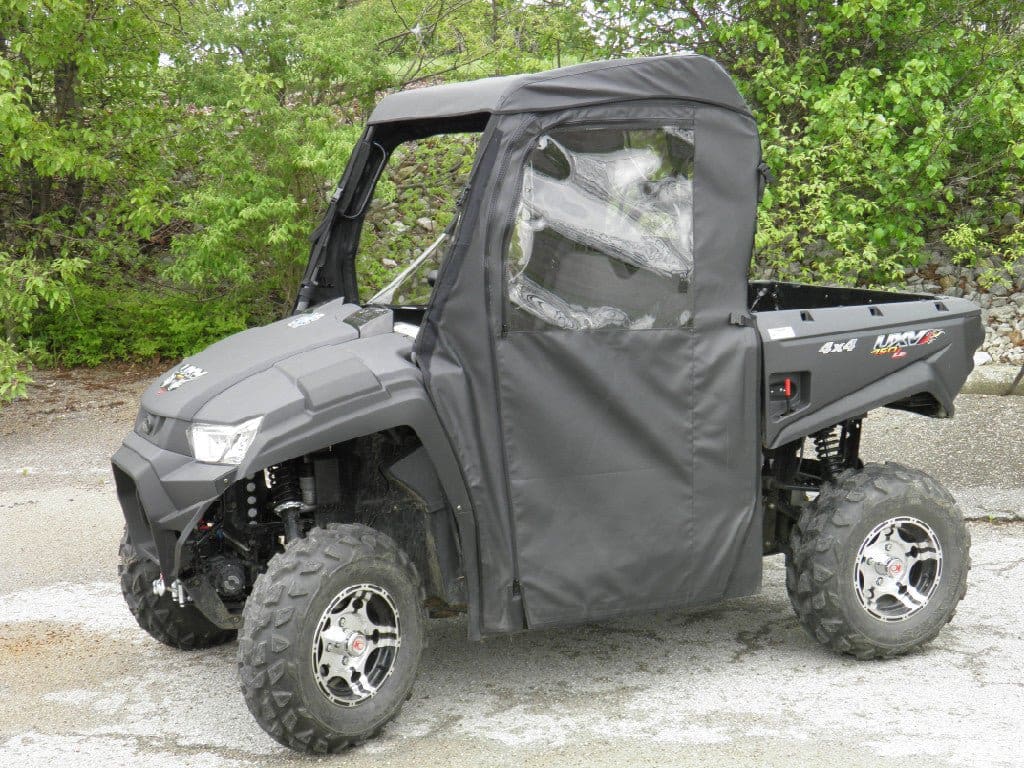 Utility vehicle with soft fabric enclosure.