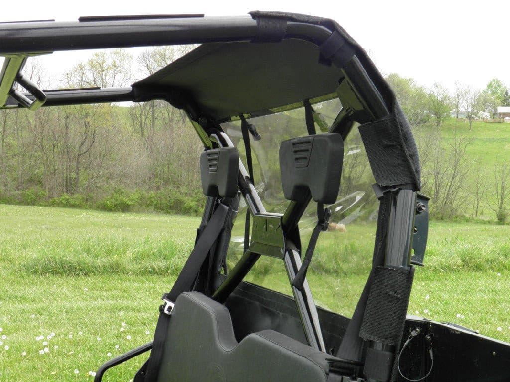 Zippered enclosure with transparent side panels.