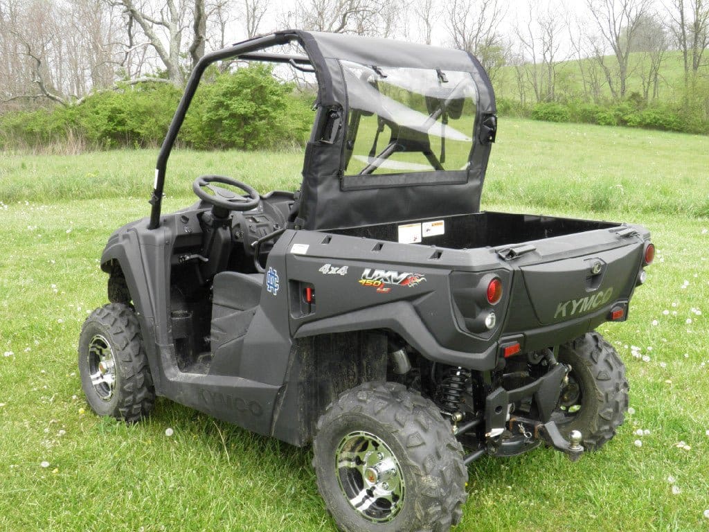 Kymco utility vehicle with soft top enclosure.