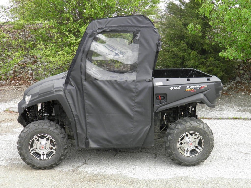 Utility vehicle with soft vinyl enclosure.