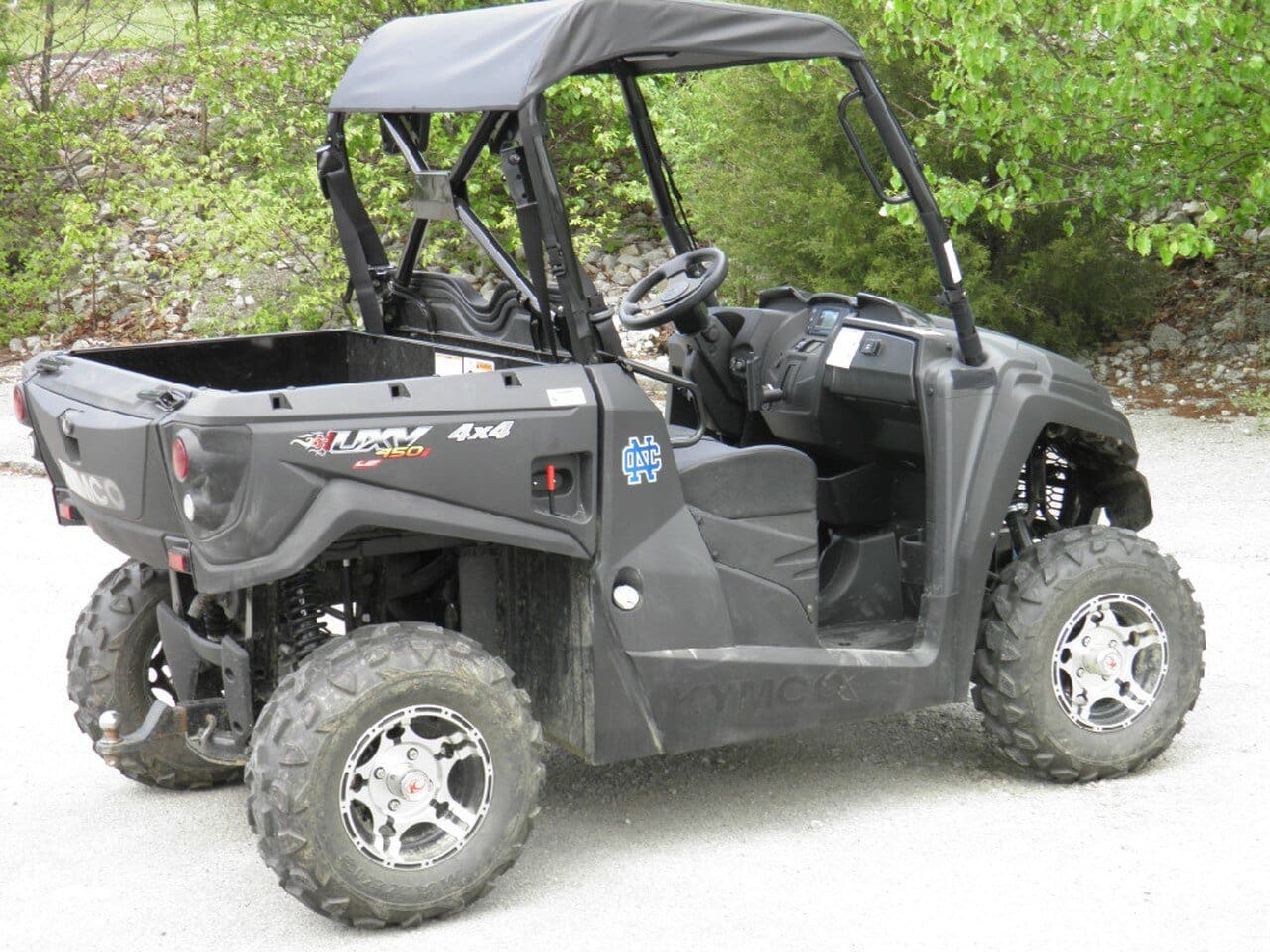 Side-by-side off-road utility vehicle