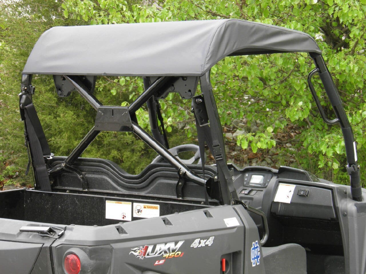 Black UTV side-by-side with canopy roof