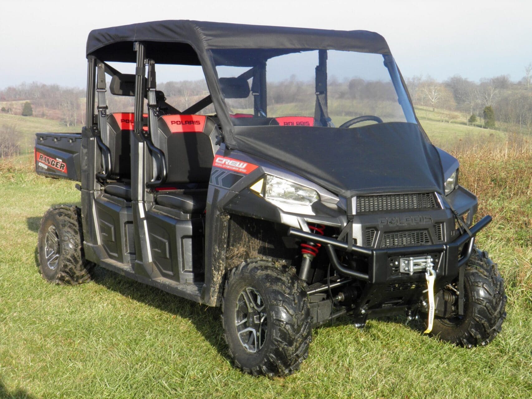 Black four-seat Polaris Ranger side-by-side UTV