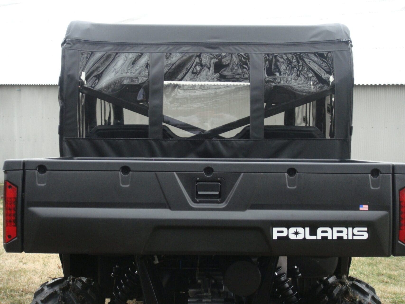 Polaris UTV rear tailgate with soft enclosure