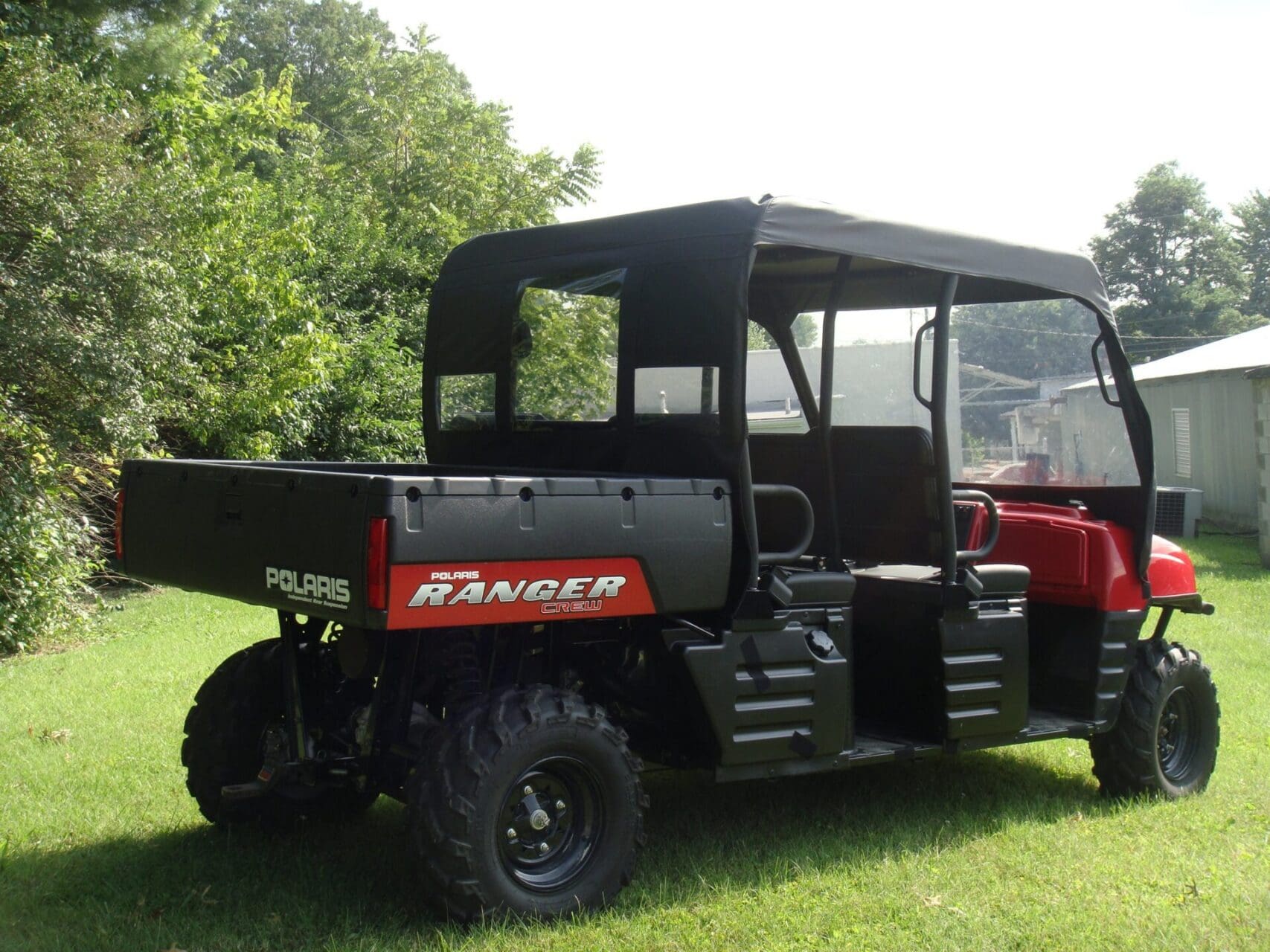 Red and black Polaris Ranger utility UTV