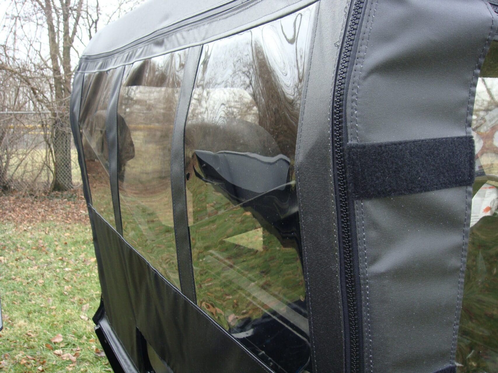 Black vinyl enclosure panel with clear window