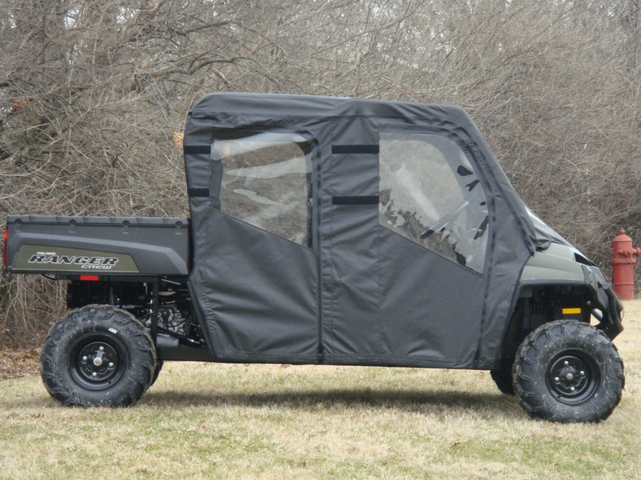 Enclosed black off-road utility vehicle
