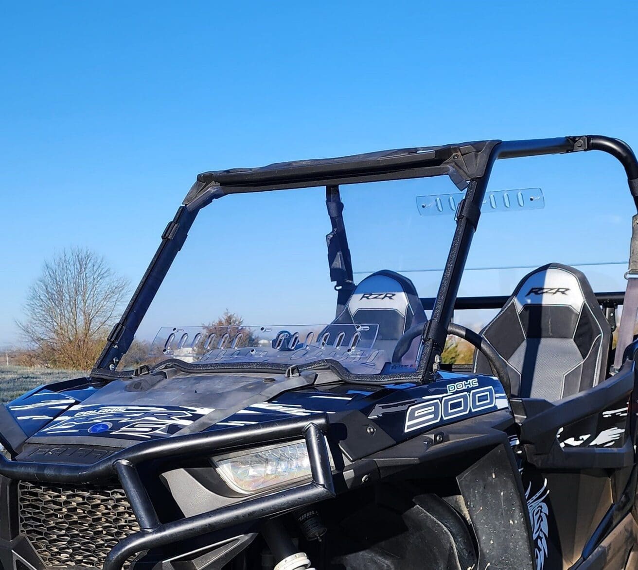 Black Polaris RZR 900 side-by-side UTV