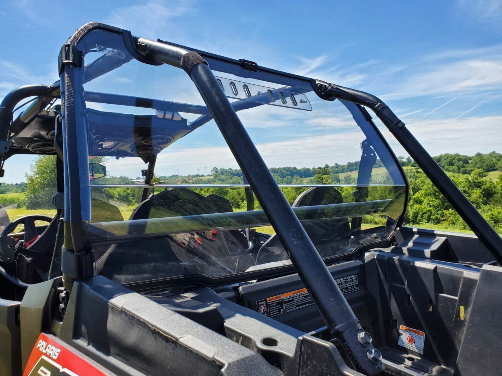 Polaris side-by-side UTV with clear windshield