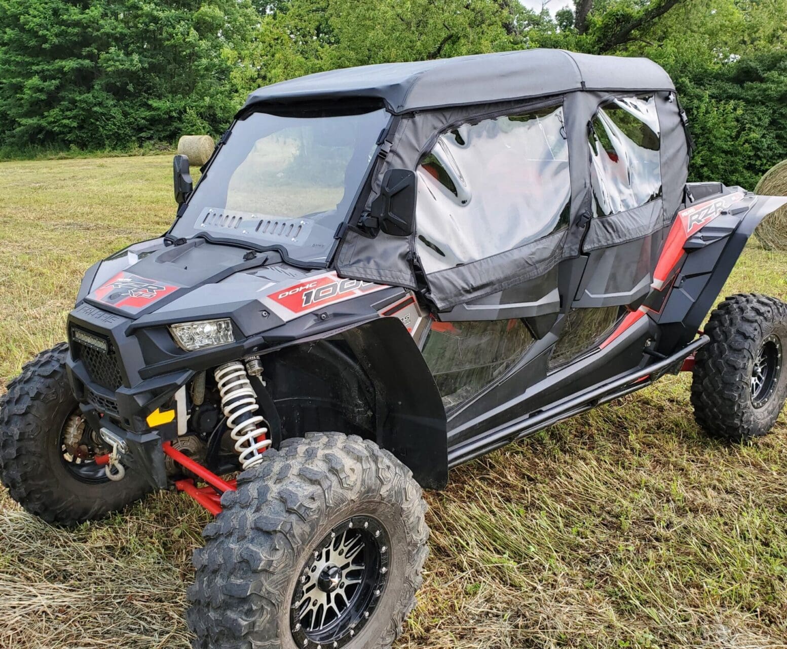 Covered off-road side-by-side UTV in field
