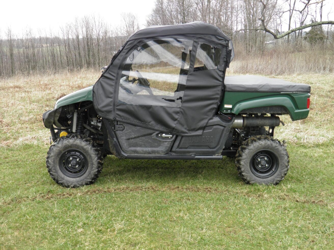 Full cab UTV with windshield protection
