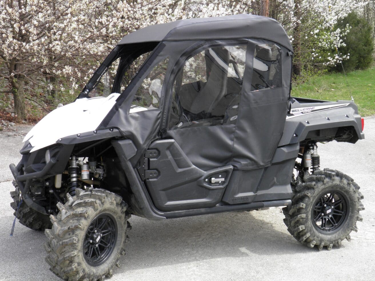 Side-by-side vehicle in rugged terrain